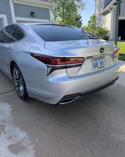 Rear view of a silver Lexus LS 500 after a detail