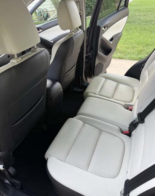 Clean white leather rear seats in a Mazda CX-5