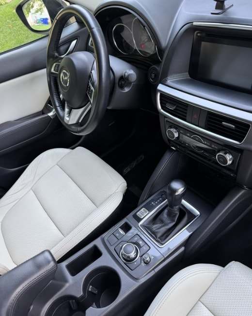 Center console and front seats of a Mazda CX-5