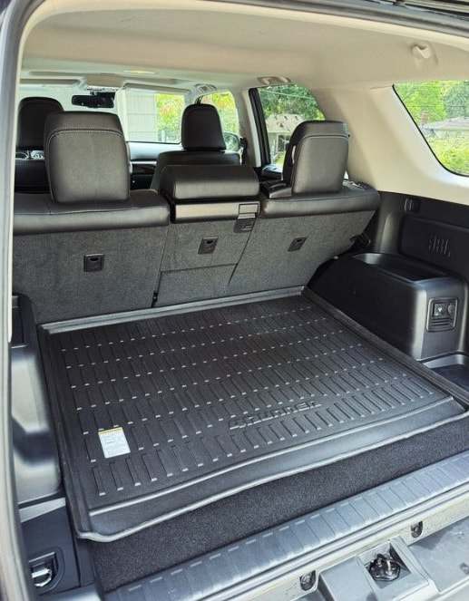 Cargo area of a Toyota 4Runner with a clean rubber mat
