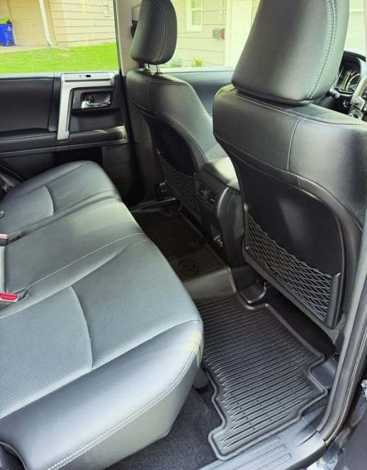 Rear seats of a Toyota 4Runner with black leather